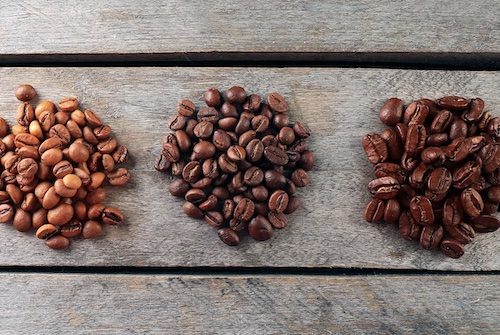 Coffee beans on a wood table